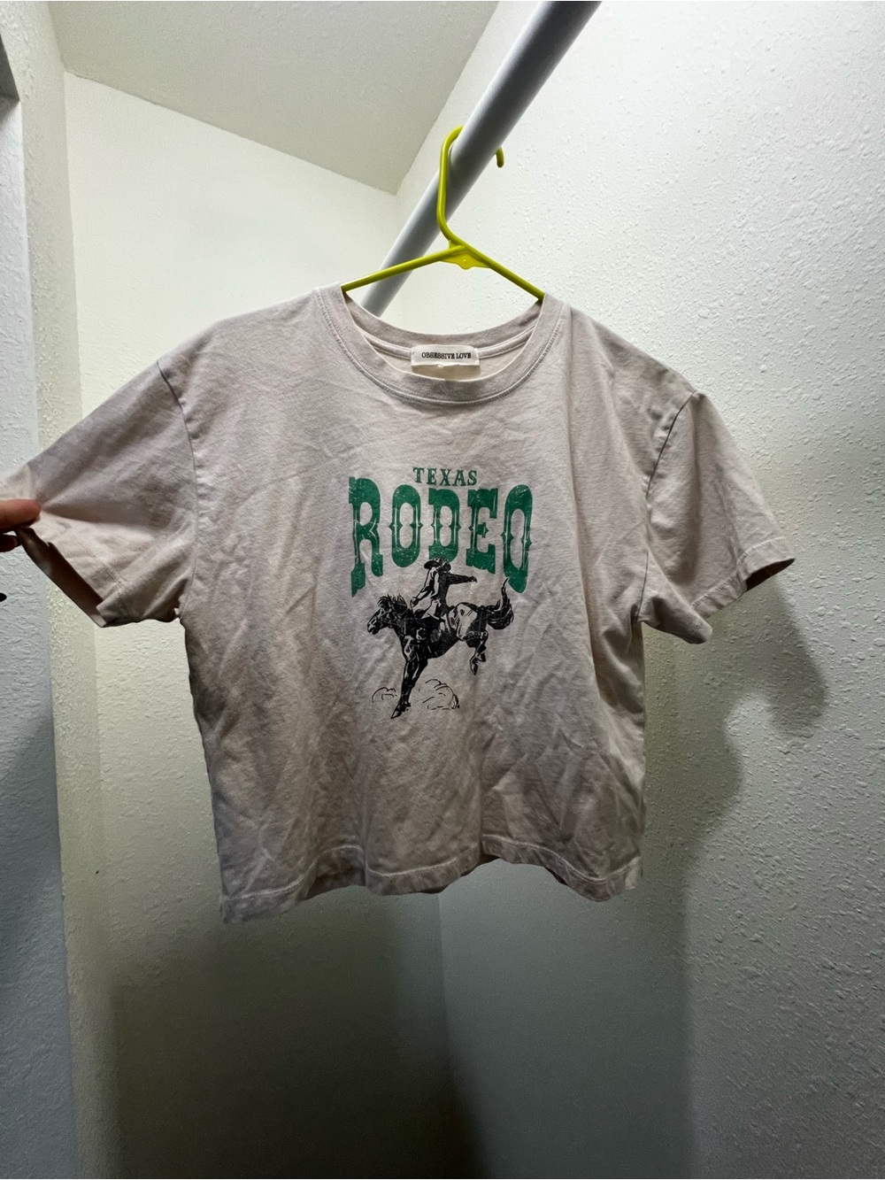Community Love Texas Rodeo Graphic Tee - Cream with Green Print